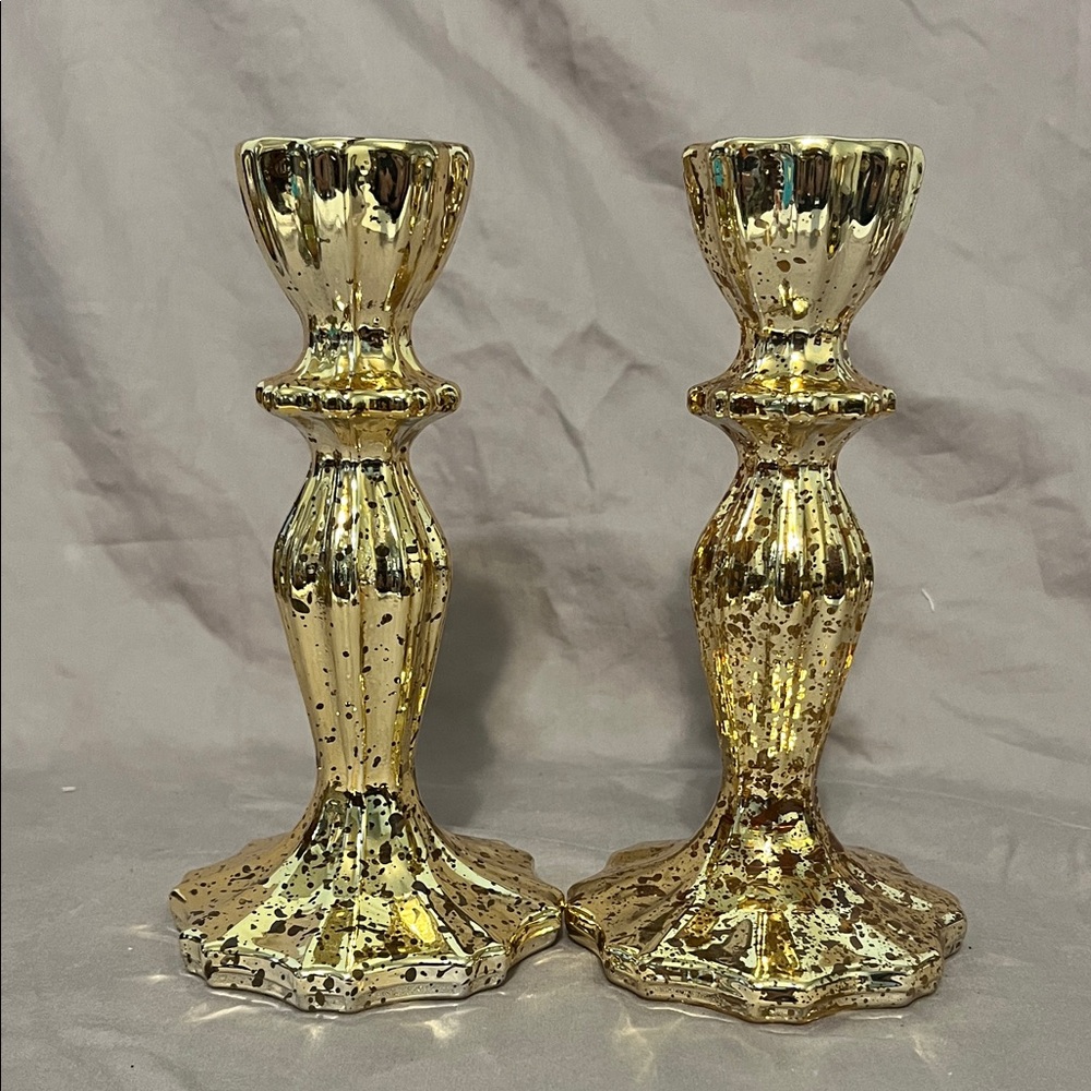 Pair of gold mercury glass candlestick holders